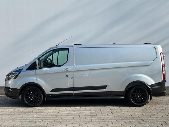 Ford TRANSIT CUSTOM 300 2.0 TDCI L2H1 TRAIL Trekhaak | Treeplanken | Dakdragers | Navi | All Season | XENON | Stoel- en Voorruitverwarming