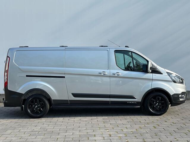 Ford TRANSIT CUSTOM 300 2.0 TDCI L2H1 TRAIL Trekhaak | Treeplanken | Dakdragers | Navi | All Season | XENON | Stoel- en Voorruitverwarming