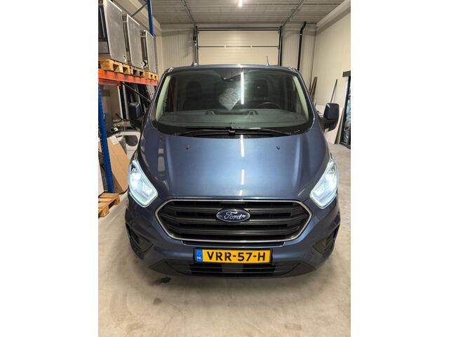 Ford TRANSIT CUSTOM 280 2.0 TDCI 130 PK AUTOMAAT L1H1 Limited | Camera | Adaptieve Cruise Control | BLIS | Lederen bekleding | Trekhaak | Winterpakket | Zijschuifdeur L+R