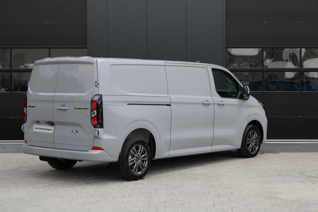 Ford TRANSIT CUSTOM 320 2.0 TDCI L2H1 Limited 150pk - 2x Schuifdeur - Adaptive Cruise - Verwarmd stuur - Blind spot - Navigatie - Camera - Draadloos laden - Rijklaar