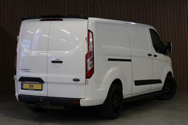 Ford TRANSIT CUSTOM 320 2.0 TDCI 190 PK L2H1 | Raptor Edition | BTW / BPM Vrij | Marge | Camera | CarPlay | Trekhaak | 3-Zitter | DAB | Cruise control | PDC V+A | LED | Nieuwe APK | Dealer onderhouden