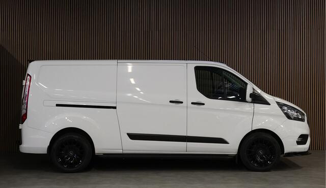 Ford TRANSIT CUSTOM 340 2.0 TDCI 190 PK L2H1 | Raptor Edition | Blind Spot | Bi-Xenon | Navigatie | Camera | CarPlay | 3-Zitter | DAB | Cruise control | PDC V+A | LED | Nieuwe APK | Dealer onderhouden