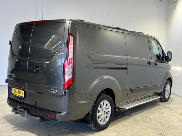 Ford TRANSIT CUSTOM 300 2.0 TDCI L2H1 Limited | Navigatie/Android/Apple Carplay | Trekhaak | Laadruimte Inrichting | Lichtmetalen 16" | Parkeersensoren Voor en Achter | Cruise Control | Airco |