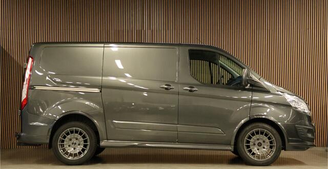 Ford TRANSIT CUSTOM 290 2.0 TDCI Sport | Camera | Navigatie | 3-Zitter | Trekhaak | PDC V+A | Lederen bekleding | MF Stuur | Nieuwe APK