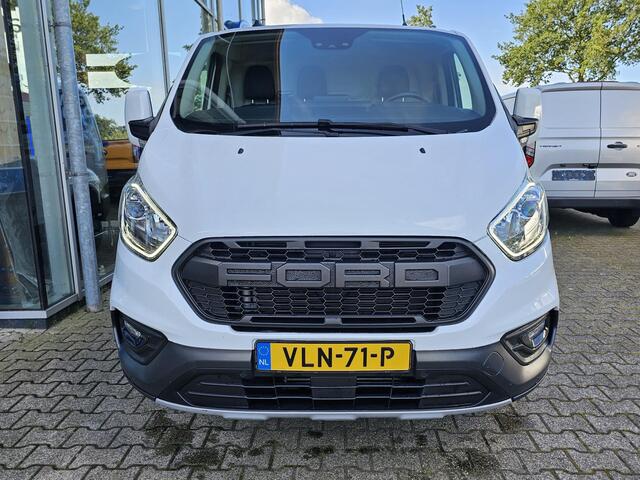 Ford TRANSIT CUSTOM 300 2.0 TDCI L2H1 Trail | Glasslook panelen | Raptor grille | Camera | Trekhaak | Leder | Voorruitverwarming | Airco | Cruise control etc.