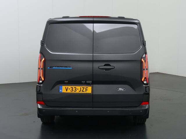 Ford TRANSIT CUSTOM e-Transit 340 | L2 H1 | LIMITED | 65 kWh | 218 PK | 328 KM WLTP | ADAPTIVE CRUISE | LED | STOELVERWARMING | PARKEERPAKKET | NAVIGATIE | 2-ZITS | LAADRUIMTE PAKKET | SNEL LADEN | CARPLAY / ANDROID AUTO | 2300 KG AHW
