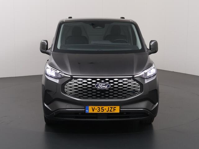 Ford TRANSIT CUSTOM e-Transit 340 | L2 H1 | Limited | 65 kWh | 218 PK | Cruise Control Adaptief | LM Velgen | 2-zits | Navigatie | Parkeercamera | Stoelverwarming | LED Koplampen | Snel-lader | Apple Carplay / Android Auto