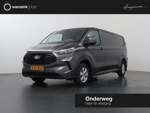 Ford TRANSIT CUSTOM 320 | 2.0 TDCI | L2 H1 | Limited | STOELVERWARMING | TREKHAAK | NAVIGATIE | CAMERA | PARKEERSENSOREN | METALLIC | LAADRUIMTE PAKKET | VOORRUITVERWARMING | 2-ZITS | STOEL STOEL | LM VELGEN