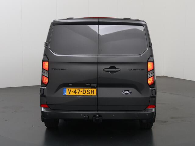 Ford TRANSIT CUSTOM 320 | 2.0 TDCI | L2 H1 | Limited | STOELVERWARMING | TREKHAAK | NAVIGATIE | CAMERA | PARKEERSENSOREN | METALLIC | LAADRUIMTE PAKKET | VOORRUITVERWARMING | 2-ZITS | STOEL STOEL | LM VELGEN