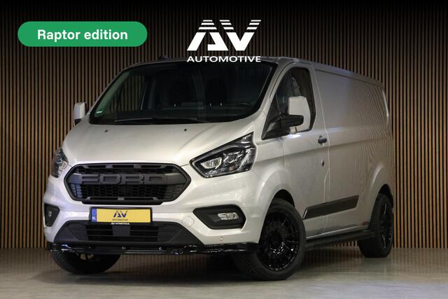 Ford TRANSIT CUSTOM 320 2.0 TDCI 170 PK L2H1 Raptor Edition | Bi-Xenon | CarPlay | ACC | Navigatie | Camera | Stoelverwarming | Dodehoek detector | DAB | Werkplaatsinrichting | 3-Zitter | Dealer onderhouden | Nieuwe APK