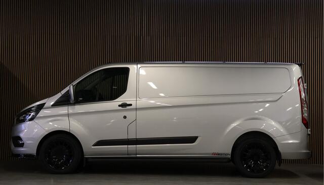 Ford TRANSIT CUSTOM 320 2.0 TDCI 170 PK L2H1 Raptor Edition | Bi-Xenon | CarPlay | ACC | Navigatie | Camera | Stoelverwarming | Dodehoek detector | DAB | Werkplaatsinrichting | 3-Zitter | Dealer onderhouden | Nieuwe APK