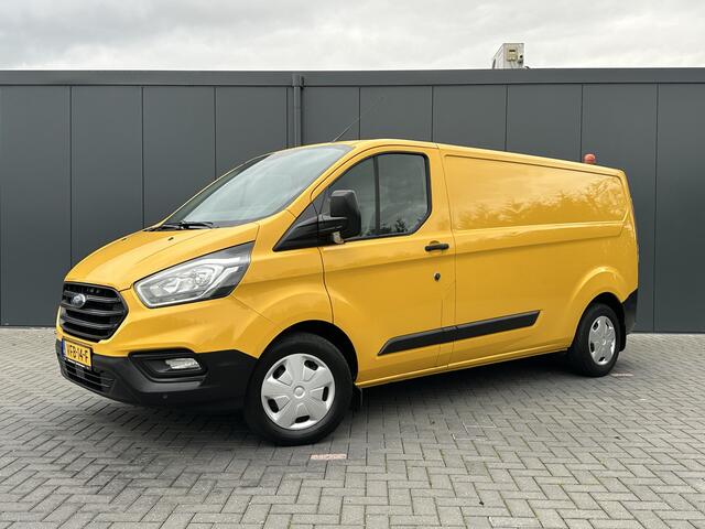 Ford TRANSIT CUSTOM 2.0 TDCI / L2H1 / 1e EIG. / ZEER NETJES / 2.800 KG TREKKEN / CRUISE / TREKHAAK / AIRCO / STOELVERW.