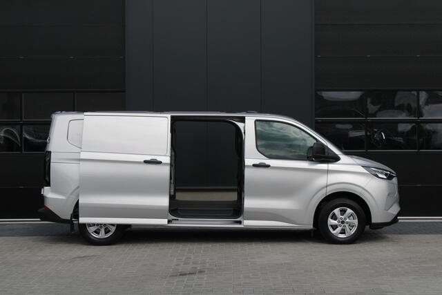 Ford TRANSIT CUSTOM 320 2.5 PHEV L2H1 Trend 232pk - 5 jaar GARANTIE - 2x Schuifdeur - Adaptive Cruise - Blind Spot - Navigatie - Camera - Verwarmd Stuur - Rijklaar
