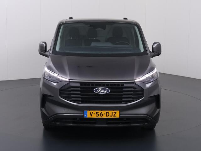 Ford TRANSIT CUSTOM 320 2.0 TDCI | L2 H1 | LIMITED | STOELVERWARMING | TREKHAAK | NAVIGATIE | CAMERA | PARKEERSENSOREN | METALLIC | LAADRUIMTE PAKKET | VOORRUITVERWARMING | 3-ZITS | LM VELGEN