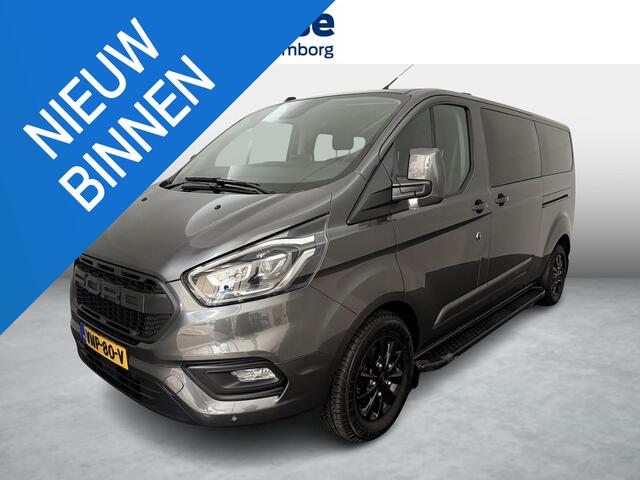 Ford TRANSIT CUSTOM 320 2.0 TDCI L2H1 Platinum Edition met o.a. een trekhaak, dodehoek detectie, elektrisch verwarmbare voorstoelen en een elektrisch verwarmbare voorruit