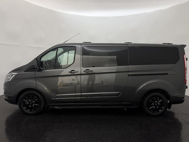 Ford TRANSIT CUSTOM 320 2.0 TDCI L2H1 Platinum Edition met o.a. een trekhaak, dodehoek detectie, elektrisch verwarmbare voorstoelen en een elektrisch verwarmbare voorruit