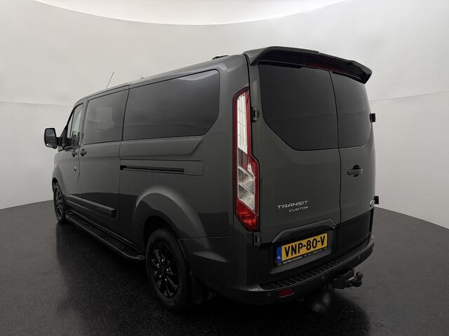 Ford TRANSIT CUSTOM 320 2.0 TDCI L2H1 Platinum Edition met o.a. een trekhaak, dodehoek detectie, elektrisch verwarmbare voorstoelen en een elektrisch verwarmbare voorruit
