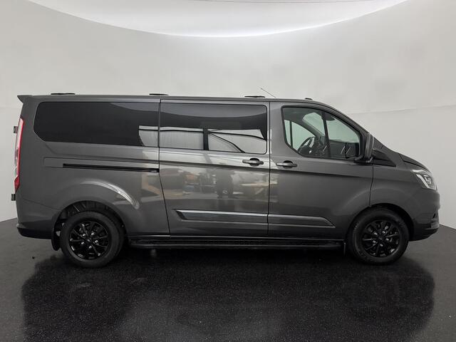 Ford TRANSIT CUSTOM 320 2.0 TDCI L2H1 Platinum Edition met o.a. een trekhaak, dodehoek detectie, elektrisch verwarmbare voorstoelen en een elektrisch verwarmbare voorruit