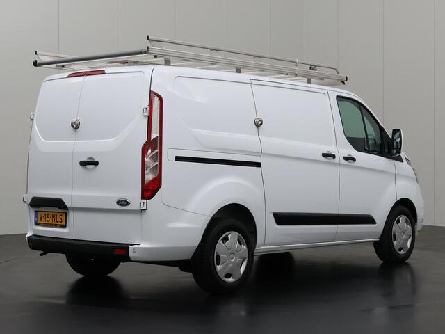 Ford TRANSIT CUSTOM 2.0TDCi 130PK Automaat | Imperiaal | Gatelocks | Navigatie | Camera | Airco | Cruise | 3-Persoons | Betimmering