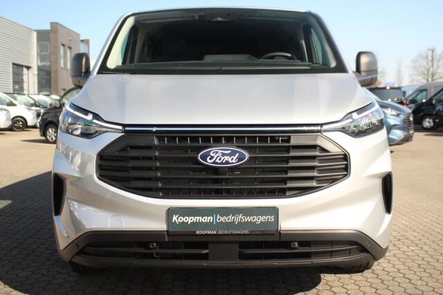 Ford TRANSIT CUSTOM E-Transit 320 L2H1 Trend 64 kWh 218pk DC Automaat | Trekgewicht 2300kg | L+R Zijdeur | Keyless | Carplay/Android | Stoel+Stuurverw | Lease 717,- p/m