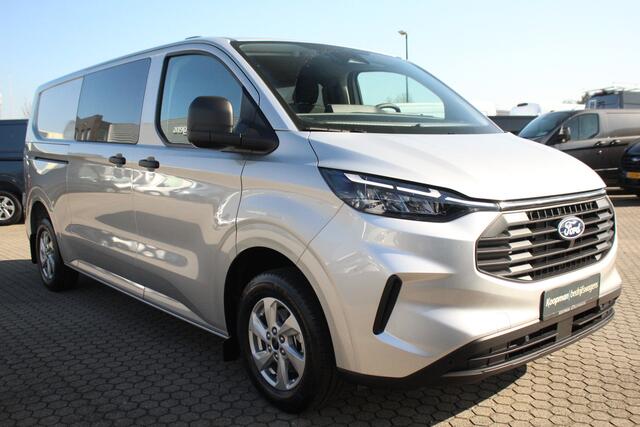 Ford TRANSIT CUSTOM E-Transit 320 L2H1 Trend 64 kWh 218pk DC Automaat | Trekgewicht 2300kg | L+R Zijdeur | Keyless | Carplay/Android | Stoel+Stuurverw | Lease 717,- p/m