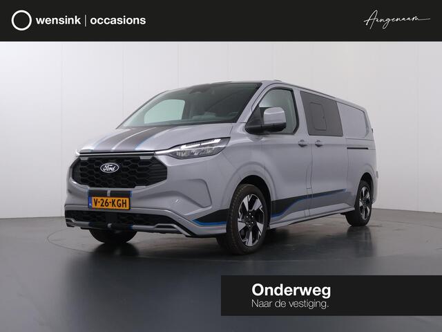 Ford TRANSIT CUSTOM 320 | 2.5 PHEV | L2 H1 | SPORT | DUBBEL CABINE | ELEKTRISCHE TREKHAAK | STOEL EN STUURWIEL VERWARMING | CLIMATE CONTROL | NAVIGATIE | CAMERA | PARKEERSENSOREN | GREY MATTER | 233 PK