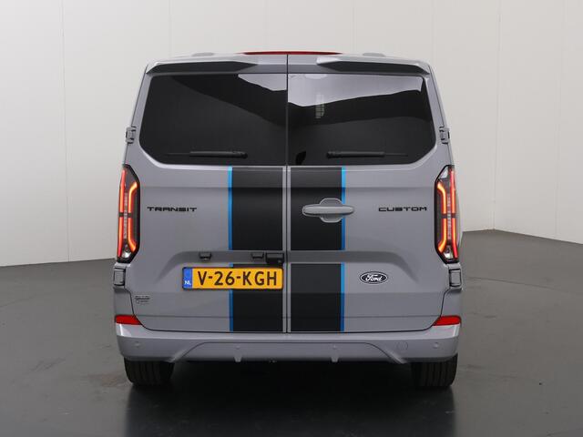 Ford TRANSIT CUSTOM 320 | 2.5 PHEV | L2 H1 | SPORT | DUBBEL CABINE | ELEKTRISCHE TREKHAAK | STOEL EN STUURWIEL VERWARMING | CLIMATE CONTROL | NAVIGATIE | CAMERA | PARKEERSENSOREN | GREY MATTER | 233 PK