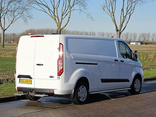 Ford TRANSIT CUSTOM 340 2.0 TDCI L2H1 Trend NAP Euro6 Airco Trekhaak Sidebars Bumpers-Kleur Oh-Historie Wp-Inrichting 1e Eigenaar!