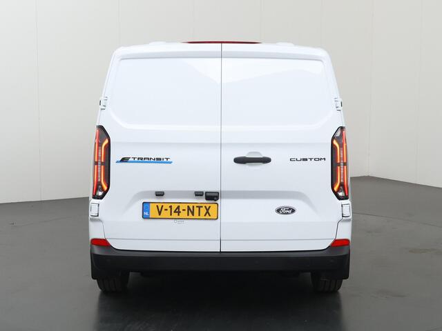 Ford TRANSIT CUSTOM E-Transit 320 | L1 H1 | TREND | 65 kWh | 328 KM RANGE | CLIMATE CONTROL | CARPLAY / ANDROID AUTO | STOELVERWARMING | SPIEGEL VERWARMING | ACHTERUITRIJCAMERA | VOORRUITVERWARMING | LAADRUIMTE PAKKET | VOORBEREIDING 2300 KG TREKHAAK