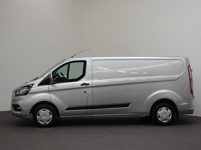 Ford TRANSIT CUSTOM 131pk L2H1 Trend Trekhaak Camera Cruise control Airco Parkeersensoren 3-Zits Euro6