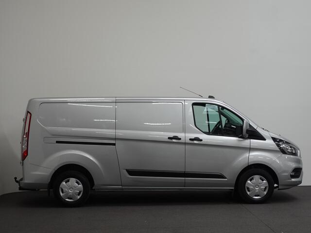 Ford TRANSIT CUSTOM 131pk L2H1 Trend Trekhaak Camera Cruise control Airco Parkeersensoren 3-Zits Euro6