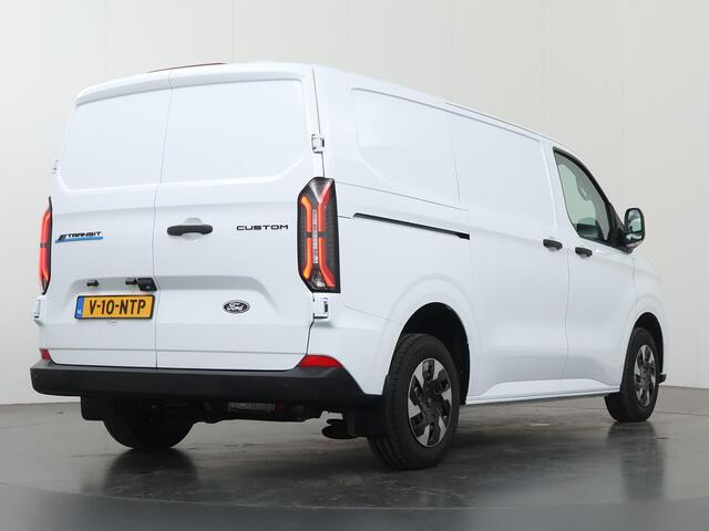 Ford TRANSIT CUSTOM E-Transit 320 | L1 H1 | TREND | 65 kWh | 328 KM RANGE | CLIMATE CONTROL | CARPLAY / ANDROID AUTO | STOELVERWARMING | SPIEGEL VERWARMING | ACHTERUITRIJCAMERA | VOORRUITVERWARMING | LAADRUIMTE PAKKET | VOORBEREIDING 2300 KG TREKHAAK
