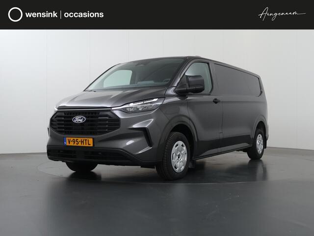Ford TRANSIT CUSTOM 320 | 2.0 TDCI | L2 H1 | TREND | BPM VRIJ! | CAMERA | CRUISE CONTROL | CLIMATE CONTROL | CARPLAY ANDROID AUTO | 2800 KG AHW MOGELIJK | COMFORT BESTUURDERSTOEL | ACHTERKLEP | STOELVERWARMING