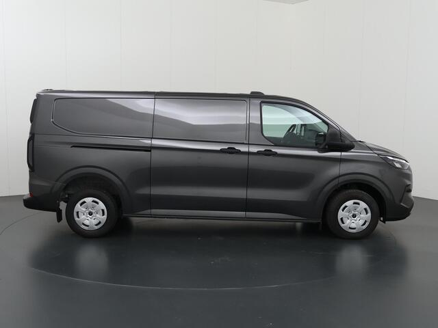 Ford TRANSIT CUSTOM 320 | 2.0 TDCI | L2 H1 | TREND | BPM VRIJ! | CAMERA | CRUISE CONTROL | CLIMATE CONTROL | CARPLAY ANDROID AUTO | 2800 KG AHW MOGELIJK | COMFORT BESTUURDERSTOEL | ACHTERKLEP | STOELVERWARMING