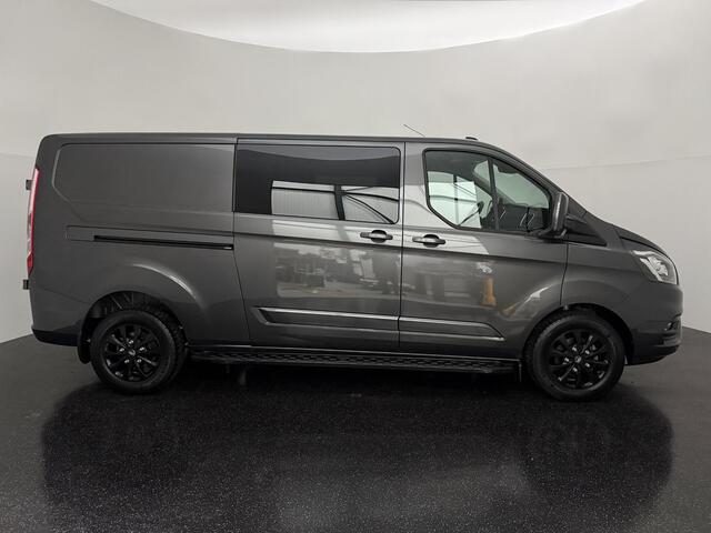 Ford TRANSIT CUSTOM 300 2.0 TDCI L2H1 Limited DC met o.a. Een Achteruitrijcamera, Parkeersensoren, Een Navigatiesysteem, Dodehoek detectie en Een Trekhaak