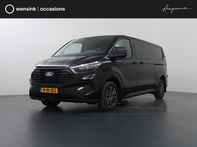 Ford TRANSIT CUSTOM 320 | 2.0 TDCI | L2 H1 | AWD | DUBBEL CABINE | LIMITED | 170 PK | CAMERA | BLIND-SPOT | ADAPTIEVE CRUISE | NAVIGATIE | STOELVERWARMING | VOORRUITVERWARMING | 2X ZIJSCHUIFDEUR | METALLIC BLACK