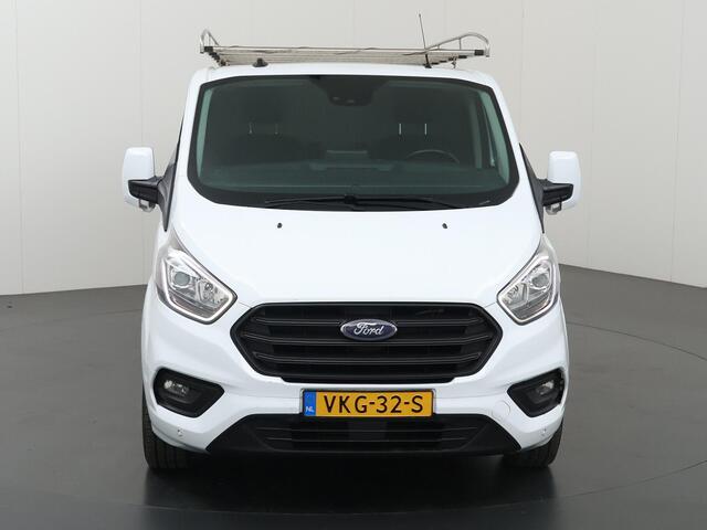 Ford TRANSIT CUSTOM 320 | 2.0 TDCI | L2 H1 | TREND | AUTOMAAT | AIRCO | CRUISE CONTROL | CAMERA | STOELVERWARMING | STOEL - STOEL | APPLE CARPLAY EN ANDROID AUTO | TREKHAAK | PARKEERSENSOREN