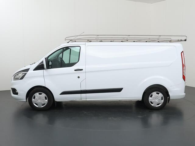 Ford TRANSIT CUSTOM 320 | 2.0 TDCI | L2 H1 | TREND | AUTOMAAT | AIRCO | CRUISE CONTROL | CAMERA | STOELVERWARMING | STOEL - STOEL | APPLE CARPLAY EN ANDROID AUTO | TREKHAAK | PARKEERSENSOREN