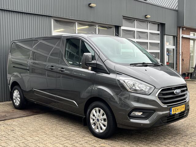 Ford TRANSIT CUSTOM 320 2.0 TDCI L2H1 Limited Airco Cruise control 3-Persoons Stoelverwarming Telefoonverbinding Navigatiesysteem Parkeersensoren voor en achter Schuifdeur Euro 6