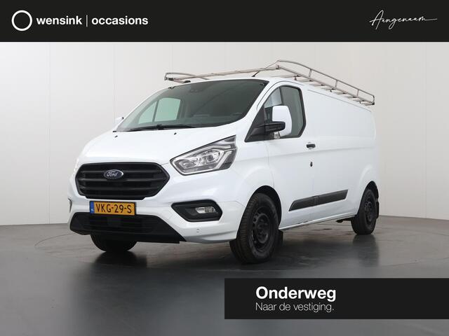 Ford TRANSIT CUSTOM 320 2.0 TDCI | Aut. | L2 H1 | TREND | AIRCO | CRUISE CONTROL | CAMERA | STOELVERWARMING | STOEL - STOEL | APPLE CARPLAY EN ANDROID AUTO | TREKHAAK | PARKEERSENSOREN