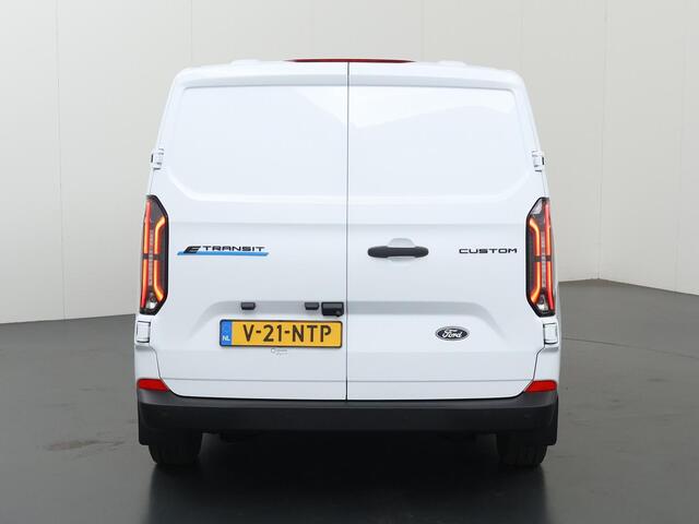 Ford TRANSIT CUSTOM E-Transit 320 | L1 H1 | TREND | 65 kWh | 328 KM RANGE | CLIMATE CONTROL | CARPLAY / ANDROID AUTO | STOELVERWARMING | SPIEGEL VERWARMING | ACHTERUITRIJCAMERA | VOORRUITVERWARMING | LAADRUIMTE PAKKET | VOORBEREIDING 2300 KG TREKHAAK