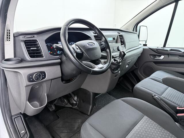 Ford TRANSIT CUSTOM 280 2.0TDCI L1H1 Trend 3-Persoons Trekhaak Airco Cruise Control Bluetooth Pdc Betonplex vloer Wandbetimmering Kasteninbouw Achterdeuren Schuifdeur 1e Eigenaar Euro 6 Origineel Nederlandse Auto