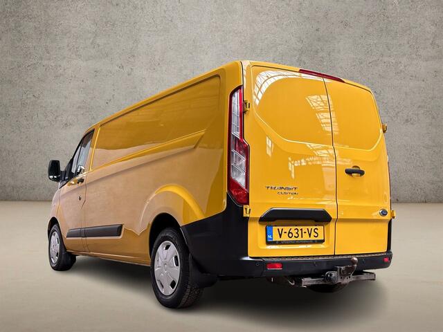 Ford TRANSIT CUSTOM 320 2.0 TDCI L2H1 Deluxe (STOELVERWARMING, BLUETOOTH, ELEK RAMEN, XENON, PARKEERSENSOREN, ARMSTEUN, TREKHAAK, CRUISE, NIEUWE APK, NIEUWSTAAT)