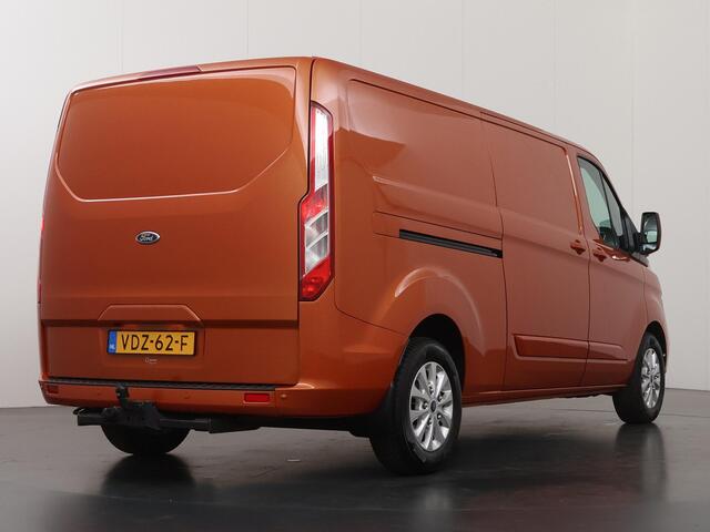 Ford TRANSIT CUSTOM 300 | 2.0 TDCI | AUT. | L2 H1 | LIMITED | NL AUTO | DEALER ONDERHOUDEN | STOELVERWARMING | CRUISE CONTROL | AIRCO | PARKEERSENSOREN | METALLIC | ORANGE GLOW