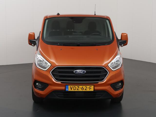 Ford TRANSIT CUSTOM 300 | 2.0 TDCI | AUT. | L2 H1 | LIMITED | NL AUTO | DEALER ONDERHOUDEN | STOELVERWARMING | CRUISE CONTROL | AIRCO | PARKEERSENSOREN | METALLIC | ORANGE GLOW