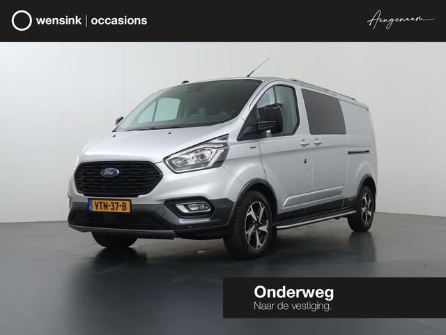 Ford TRANSIT CUSTOM 320 2.0 TDCI | L2 H1 | Active | Dubbele Cabine | Schuifdeur L + R | Trekhaak | LM Velgen | Treeplanken | 5-zits | Parkeercamera | Navigatie