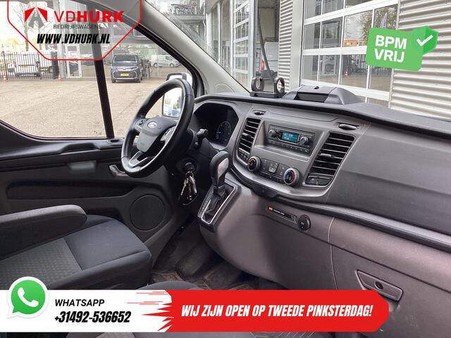 Ford TRANSIT CUSTOM 2.0 TDCI 130 pk Aut. 2x Schuifdeur/ Standkachel/ Stoelverw./ Airco/ Cruise/ Inrichting/ PDC/ DAB/ Dakdragers