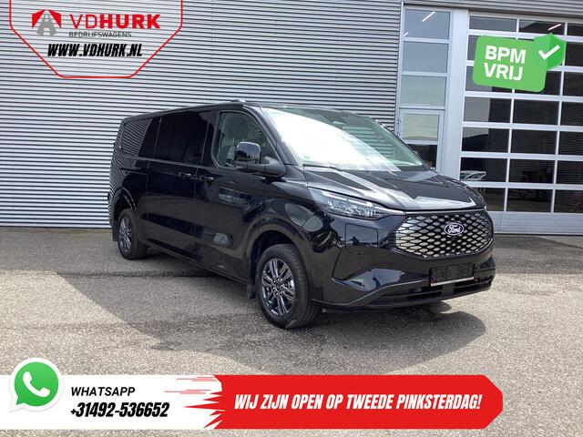 Ford TRANSIT CUSTOM E-Transit 71 kWh 218 pk 340 km WLTP L2 Limited Garantie t/m 2028/ 2x Elek.Schuif/ 2.3t Trekverm./ Snellader/ B&O/ Adapt.Cruise/ Standkachel/ Carplay/ 360 Camera/ Trekhaak