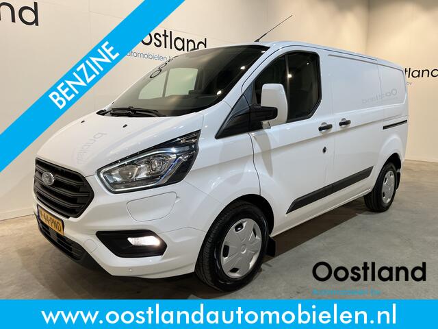 Ford TRANSIT CUSTOM 340 L1H1 PHEV Benzine Hybride Trend Automaat / Euro 6 / Schuifdeur L + R / Airco / CarPlay / Cruise Control / Camera / Navigatie / Klep / 3-Zits / 18.300 KM !!