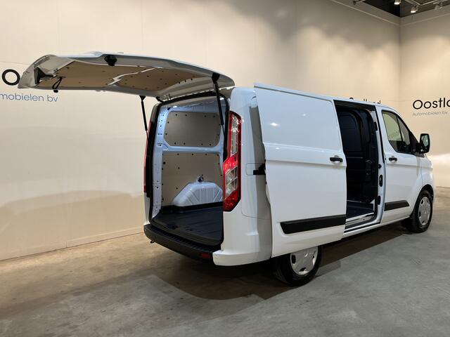 Ford TRANSIT CUSTOM 340 L1H1 PHEV Benzine Hybride Trend Automaat / Euro 6 / Schuifdeur L + R / Airco / CarPlay / Cruise Control / Camera / Navigatie / Klep / 3-Zits / 18.300 KM !!